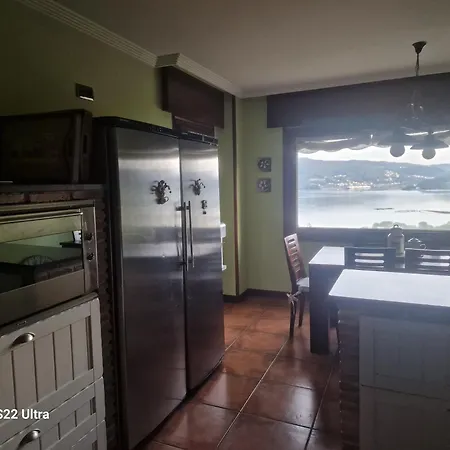 Сasa de vacaciones O Piñón *